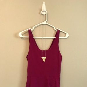 Peplum tank with cross back